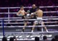 Fighters compete inside the ring at BYON Combat Showbiz 3 at Tennis Indoor Senayan in Jakarta.