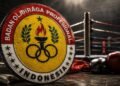 Officials oversee an Indonesian professional combat sports event after the dissolution of BOPI.