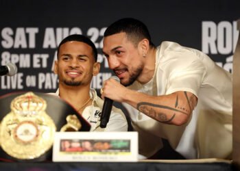 Teofimo Lopez lands a left jab against Rolando Romero during their WBA welterweight championship fight at T-Mobile Arena.
